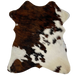 Tricolor Mini Cowhide:  has a black and brown, brindle pattern covering half of the hide, and off-white with spots that have a mix of black and brown covering the rest of the hide - 2'8" x 2'3" (MINI190)