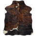 XS Black and Brown Brindle Cowhide, with two small, white spots in the middle of the shoulder, a larger white spot across the left side, near the lower edge, and white on part of both hind shanks - 4'6" x 3'5" (XS205)